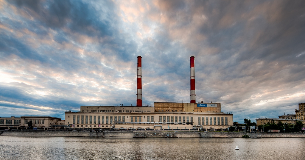 The image shows a Gazprom facility by the Moscow River.